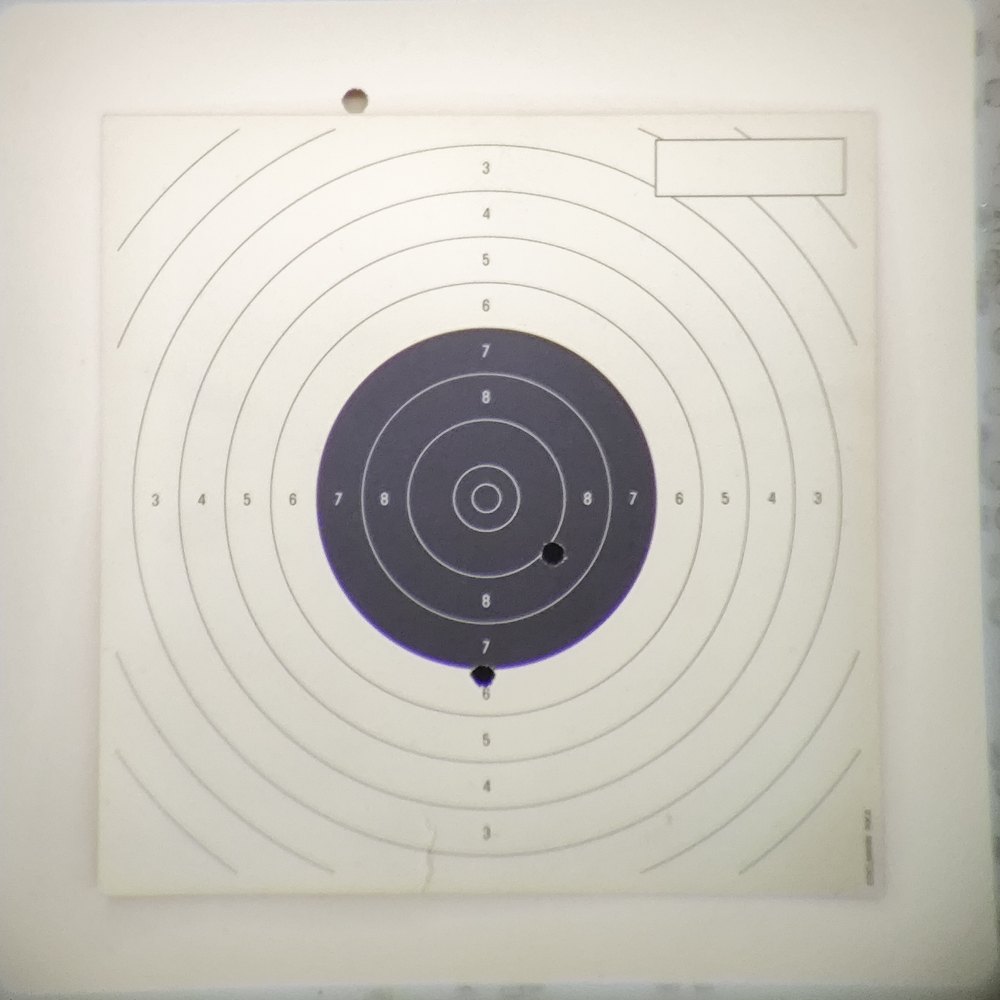 Photo of a shot 10 m air pistol target, of the kind AprèsShot evaluates