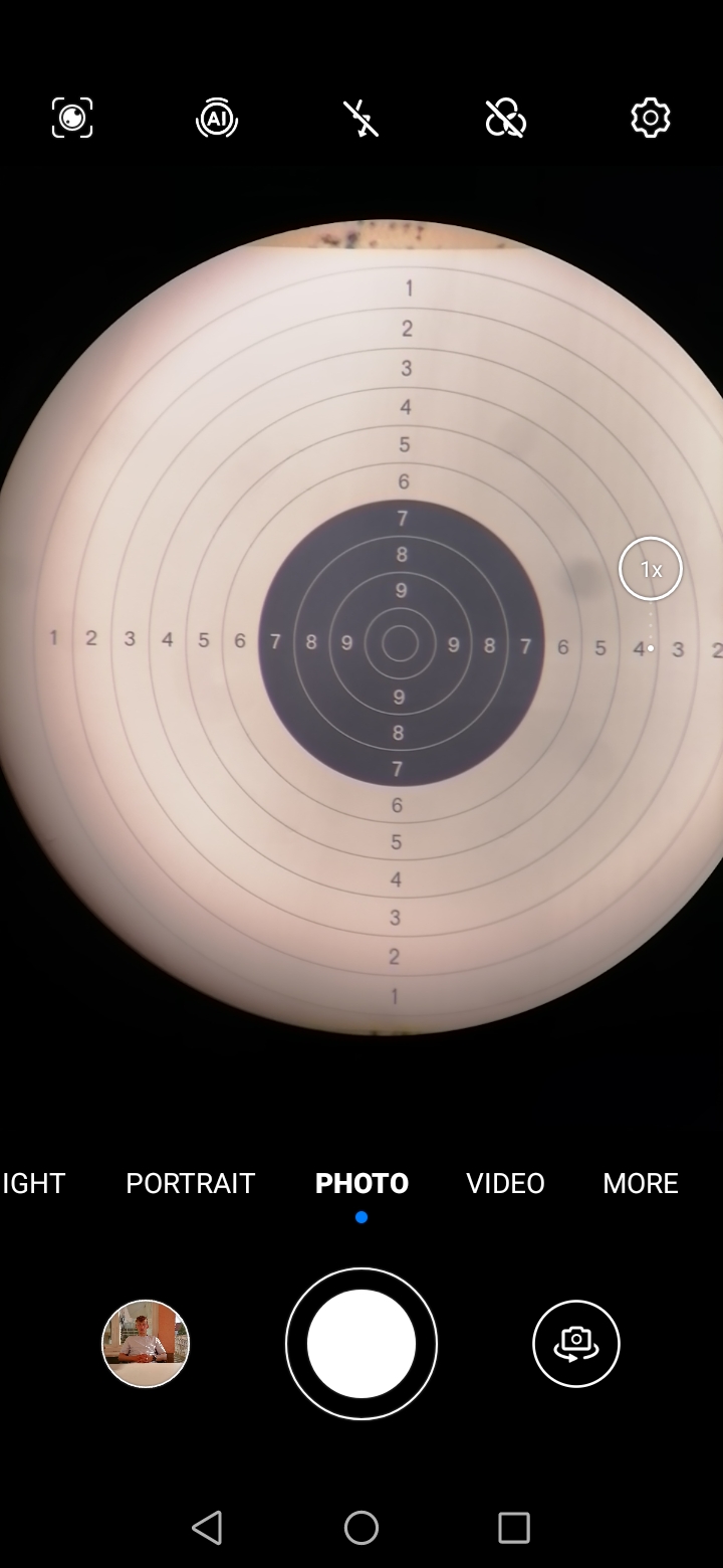 Smartphone in the mount on the spotting-scope eyepiece